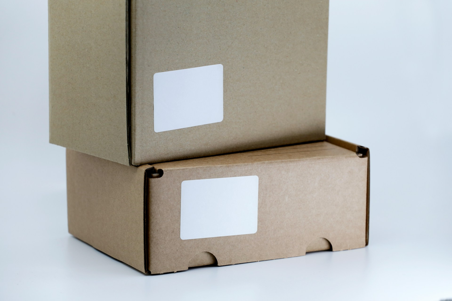 brown-cardboard-box-on-white-table
