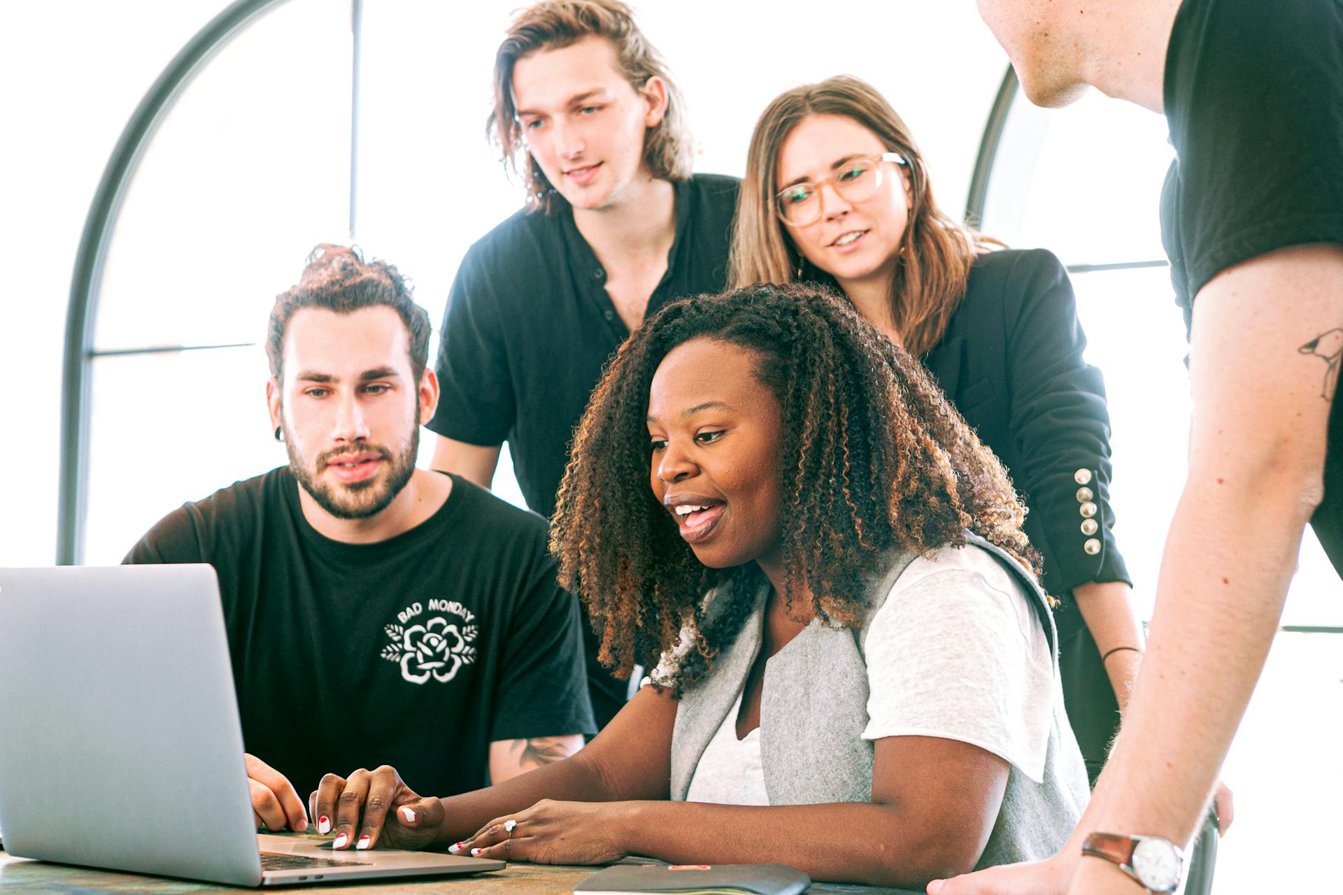 woman-sharing-her-presentation-with-her-colleagues