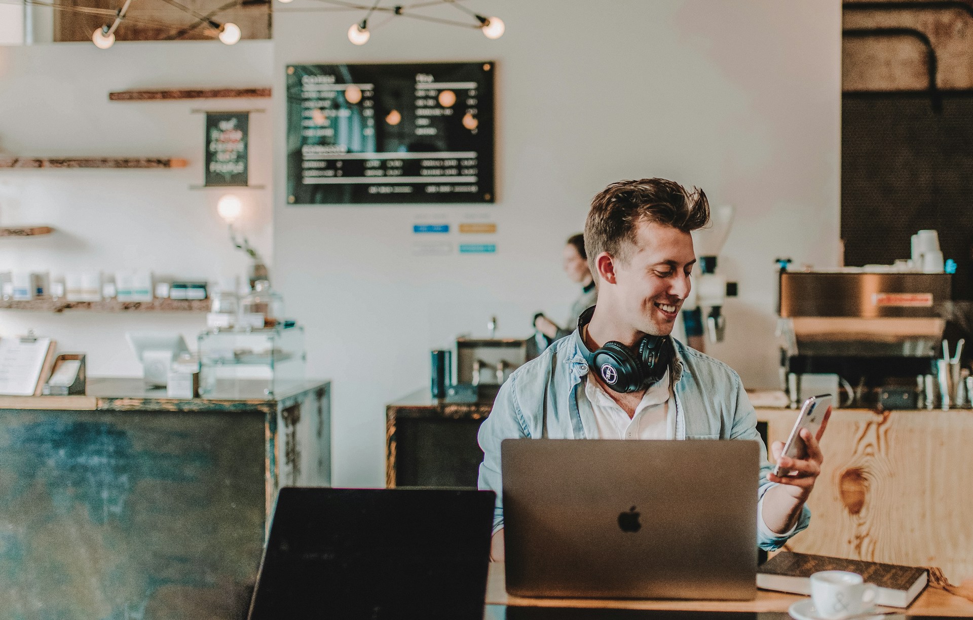 man-using-smartphone-smiling