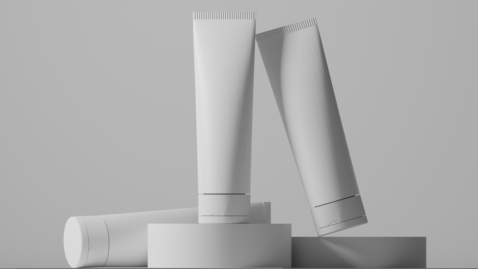 a-pair-of-white-toothbrushes-sitting-on-top-of-a-table