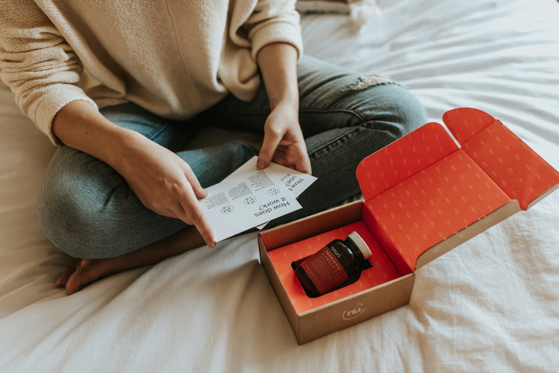 red-labeled-amber-glass-tub-on-a-box