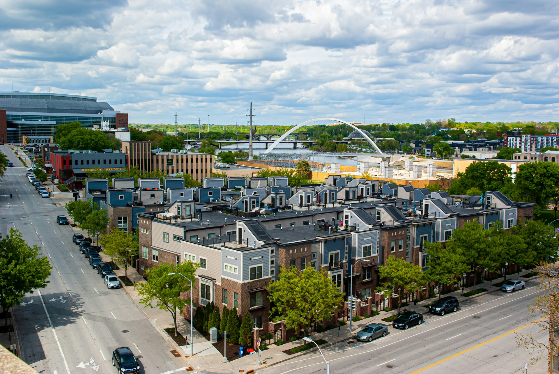 cars-parked-on-roadside-near-buildings-during-daytime