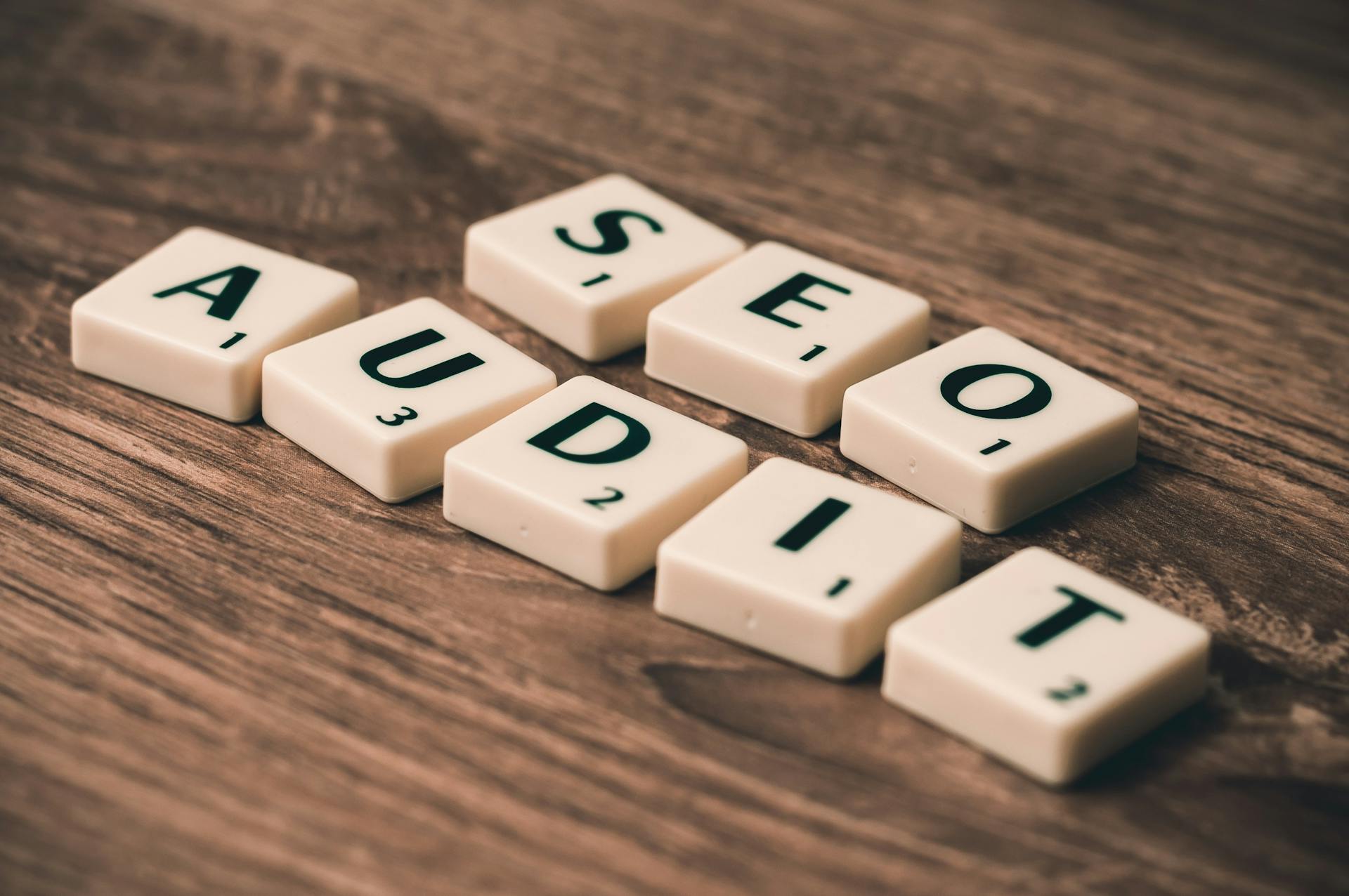 seo-audit-white-blocks-on-brown-wooden-surface