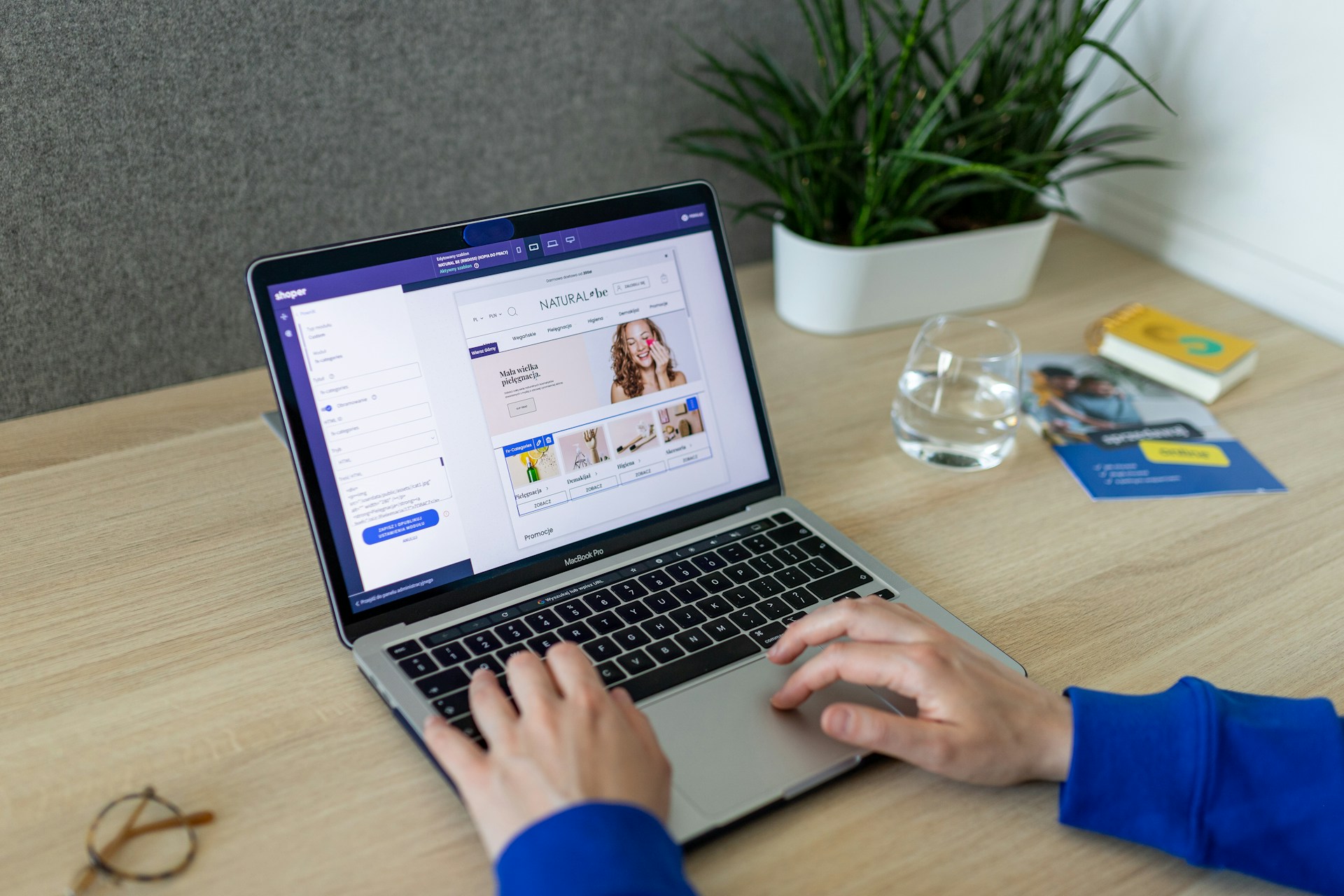 a-person-typing-on-a-laptop-on-a-table