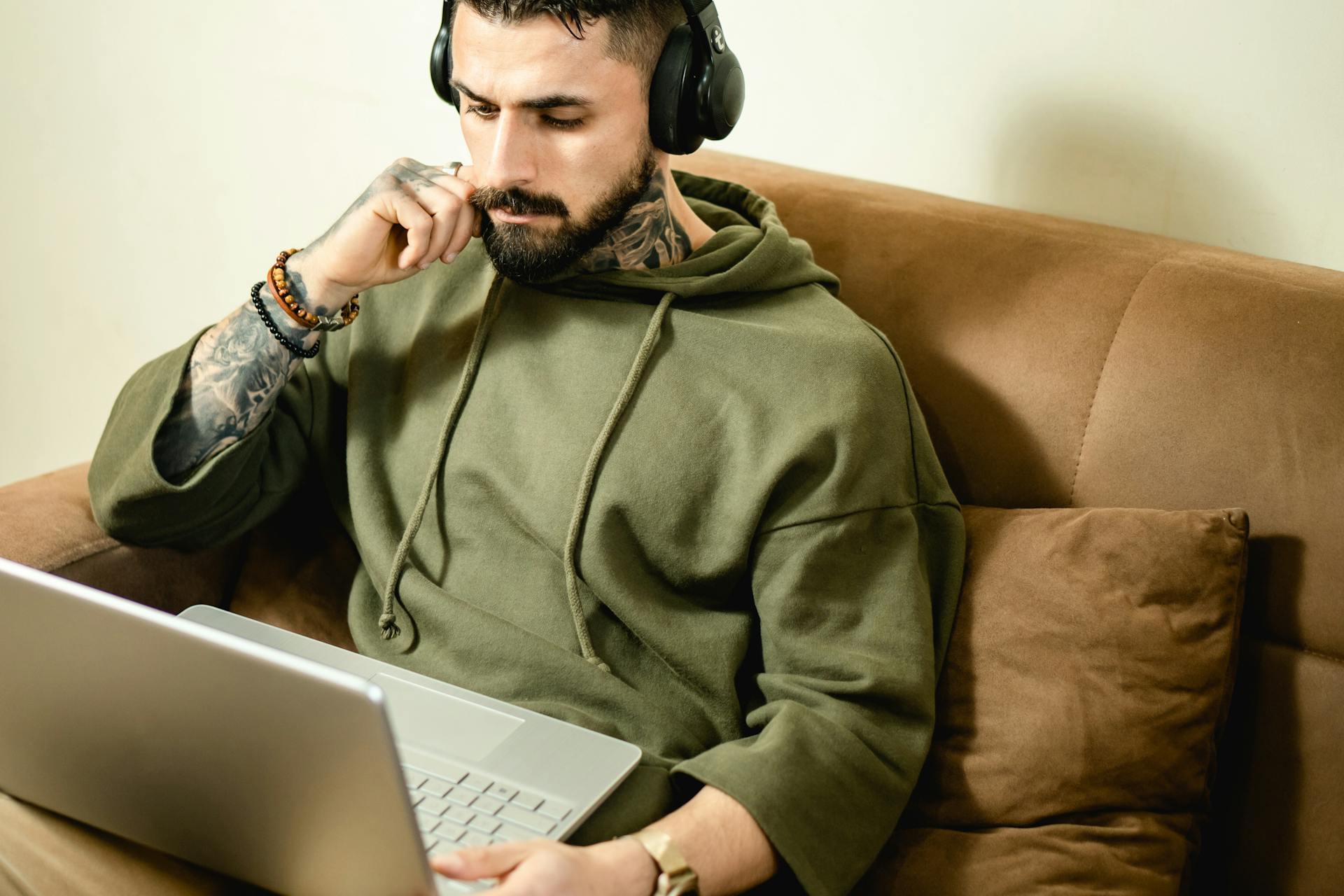 absorbed-man-looking-at-his-laptop