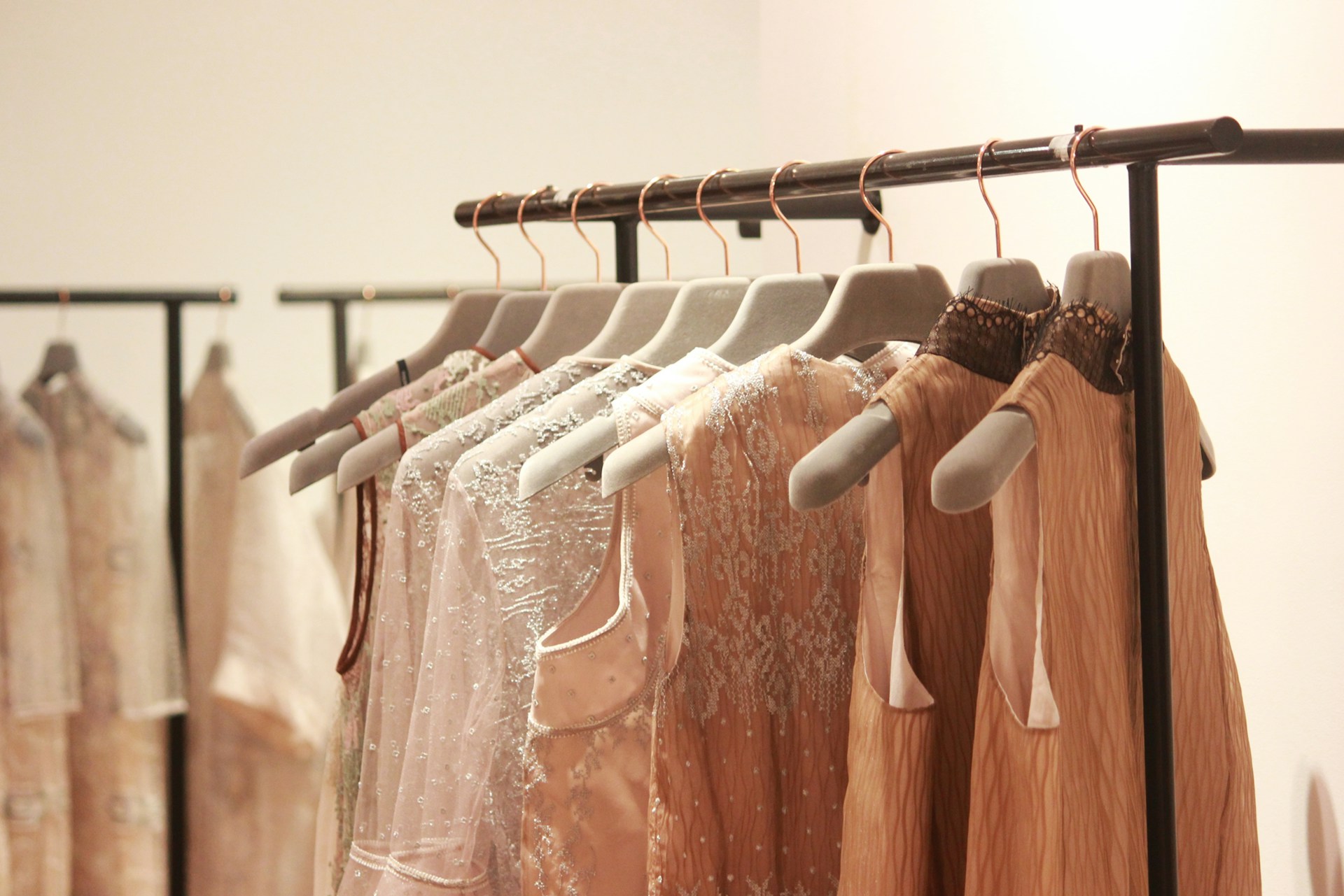 assorted-tops-hanging-indoors